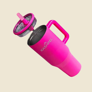 Kashpel 1.2L insulated tumbler in bright pink with a handle, straw, and lid, set against a black background.