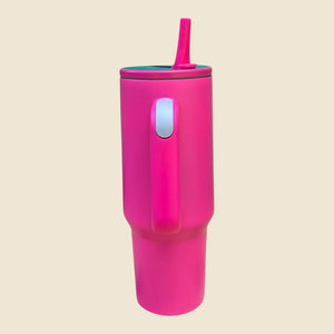 Kashpel 1.2L insulated stainless steel tumbler in bright pink with a convenient handle, lid, and matching straw.