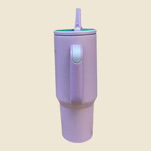 Kashpel 1.2L insulated stainless steel tumbler in matte light purple with a convenient handle and straw lid.